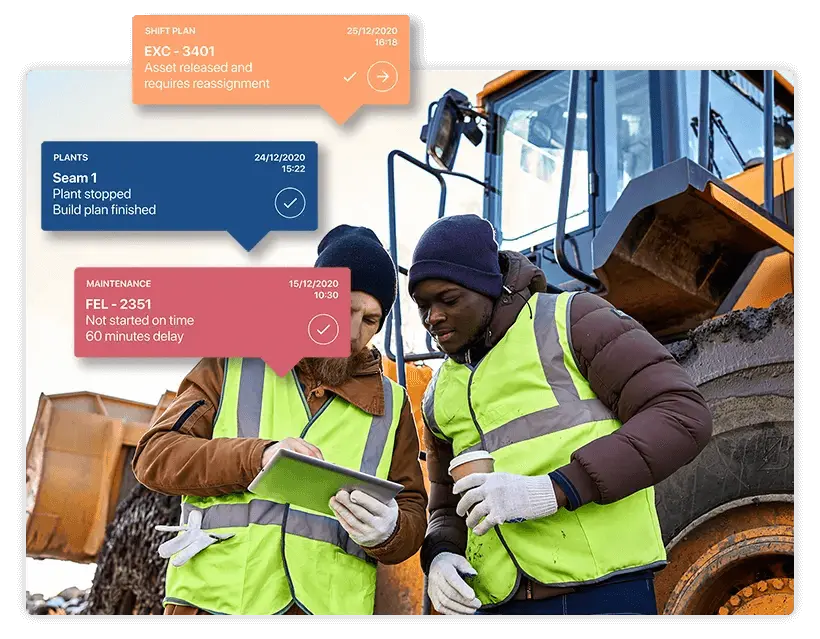 Dois trabalhadores da construção civil vestidos com coletes de alta visibilidade e roupas quentes analisam informações em um tablet. Três caixas coloridas com texto, contendo detalhes de várias tarefas e prazos, estão sobrepostas na imagem. Um grande veículo de construção pode ser visto em segundo plano.